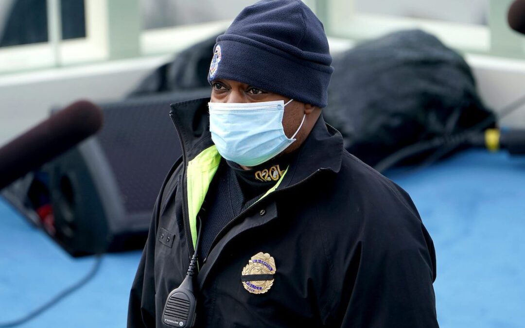 CAPITOL POLICE OFFICER WHO WAS AGAINST RIOT ESCORTED KAMALA HARRIS AT INAUGURATION